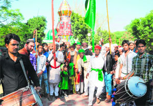 Devotees take out a tazia on the occasion of Muharram in Sector 29, Chandigarh, on Friday.