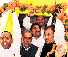 HJC president Kuldeep Bishnoi (centre) with BJP leader Krishan Pal Gurjar (second from left) during his Vijay Rath Yatra in Faridabad on Friday