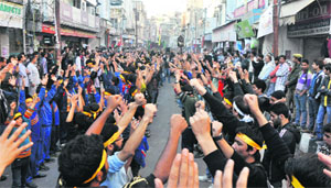 Muslims participate in a procession to mark Muharram in Jammu on Friday.