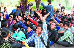 Students protest against the fee hike at Panjab University. Tribune photo: Parvesh Chauhan