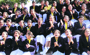 Spectators cheering participants during the annual sports meet at St Josephs Academy in Dehradun