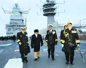 Defence Minister AK Antony on board INS Vikramaditya (Admiral Gorshkov) during its induction into the Indian Navy at the Sevmash Shipyard in Russia on Saturday.