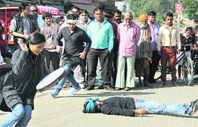 Members of a Delhi-based group perform a play at Jalandhar to spread awareness on epilepsy ahead of the World Epilepsy Day
