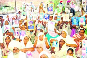 A file photo of protesting kin of farmers who committed suicide owing to debt