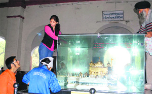 Volunteers of NGOs during a cleanliness drive at the Amritsar railway station on Sunday. 