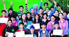 Winners of the Mohali District Chess Championship at Gurukul World School, Sector 69, Mohali, on Sunday. Tribune photo: Vicky Gharu
