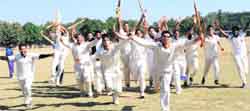 Players of Govind National College, Ludhiana, in a jubilant mood after winning the final of the Inter-College Cricket Tournament at Panjab University in Chandigarh on Sunday. Tribune photo: Parvesh Chauhan