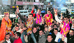 Mandi parliamentary constituency Youth Congress president Aditya Vikram Singh (extreme left) with other winning delegates during a victory rally in Mandi on Sunday