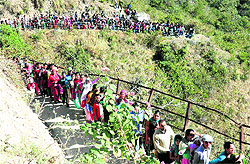 Pilgrims await their turn to pay obeisance at the Jayanti Mata temple in Kangra town on Sunday