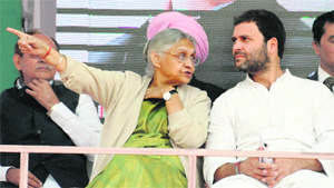 Congress vice-president Rahul Gandhi and Delhi Chief Minister Sheila Dikshit during an election rally in New Delhi on Sunday. 