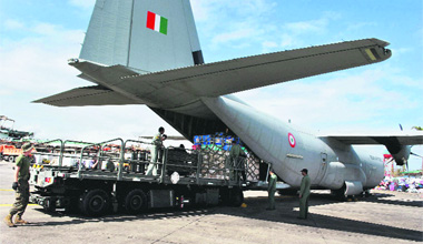An Indian Air Force C 130 J unloads relief material in Mactan on Saturday. The nation is facing an enormous rebuilding task from Typhoon Haiyan, which killed at least 3,974 people and left 1,186 missing. 