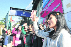 SFI activists raise slogans in support of their demands at the RKMV College in Shimla on Monday. Photo: Amit Kanwar