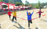 Students participate in a race in the annual sports meet of MIT International School on Sunday. A Tribune photograph