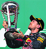 Sebastian Vettel celebrates after winning the Austin F1 Grand Prix at the Circuit of the Americas in Austin on Sunday