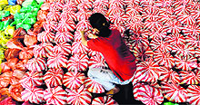 A student prepares relief packages before distributing them to typhoon victims in the Philippines on Monday