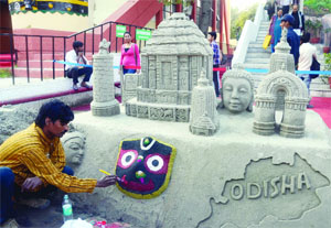 An artist, Sridhar Dash, builds