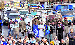 BSP leaders and workers block the national highway at PAP Chowk in Jalandhar on Tuesday