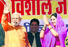 BJPs Narendra Modi with party candidate Diya Kumari at a rally at Sawai Madhopur in Rajasthan on Tuesday