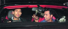Yuvraj Singh and Rohit Sharma arrive for the bash thrown by the Tendulkars in Mumbai on Monday night. The party was attended by around 1,000 guests. PTI 