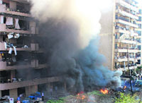 Flames rise from a damaged building of the Iranian Embassy in Beirut on Tuesday.  AFP