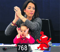 Member of European Parliament Licia Ronzulli with her daughter during a voting session at Parliament in Strasbourg on Tuesday.  Reuters