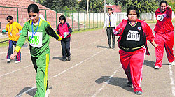 Special children participate in a walk at the Sports Complex, Sector 7, Chandigarh, on Wednesday
