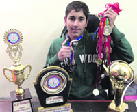 Sahib Singh Sidhu with his medals and trophies in Ludhiana. A tribune photograph