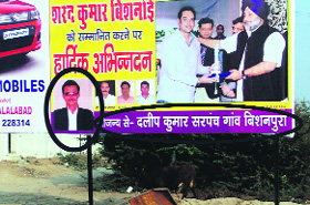 A hoarding put up on behalf of jailed sarpanch Daleep Kumar Bishnoi (encircled) in Abohar.  