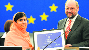 Malala Yousafzai receives the Sakharov Prize from European Parliament President Martin Schulz in Strasbourg on Wednesday. 