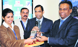 AAI Secretary G Asok Kumar (right) and airport director Suneel Dutt (second from right) inaugurate the GPRS-enabled Electronic Data Capture system at Sri Guru Ram Das Ji International Airport in Amritsar on Thursday.
