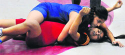 Grapplers in action during the PU Inter-College Wrestling Tournament at the PU on Thursday. Tribune photo