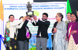 Winners of the Inter-house debate competition at Sardar Bhagwan Singh PG Institute of Biomedical Sciences and Research, Balawala, in Dehradun on Thursday. A Tribune photograph