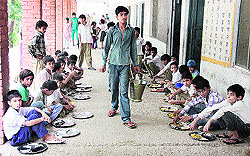 Mid-day meal being served to students in a school in Jalandhar