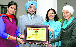 Winners of a debate competition from GNIMT in a jubilant mood at the PHD House in Chandigarh