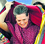 Congress chief Sonia Gandhi being presented a shawl at a rally in Jhabua, Madhya Pradesh, on Thursday