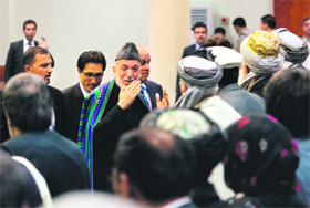 Afghan President Hamid Karzai at the Afghan loya Jirga, a meeting of around 2,500 Afghan tribal elders and leaders, in Kabul on Thursday.