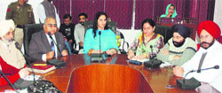 Dr Navjot Kaur Sidhu (centre), Chief Parliamentary Secretary, Health, holds a meeting during the inauguration of the state government's Bhagat Puran Singh Beema Yojana at the Civil Hospital in Amritsar. Photo: Sameer Sehgal 