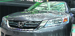 A Green Car of the Year award winning 2014 Honda Accord Hybrid is displayed at the 2013 