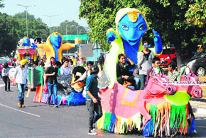 Students take part in a parade during the Chandigarh Carnival at the Leisure Valley in Chandigarh on Friday.