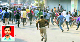 The police disperse agitating students who went on the rampage burning and damaging buses after a student (inset) was crushed to death by a Haryana Roadways bus in Gurgaon on Friday.