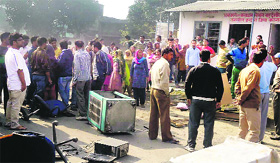 Villagers ransack an office of the Excise and Taxation Department near Toki village on the state border on Friday.