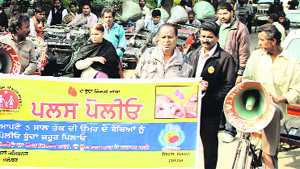 Health officials flag off the rickshaw rally to spread awareness about polio in Jalandhar.