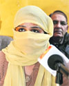 The victim woman demands exemplary punishment for the groom, who cheated her, in Jammu on Friday.