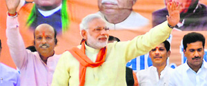 BJP prime ministerial candidate Narendra Modi at a rally in Khandwa, Madhya Pradesh, on Friday. 