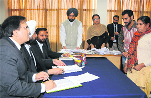 The honourable judges at the Lok Adalat held in Bathinda on Saturday. 