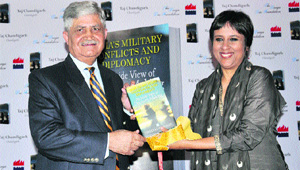 Former Chief of the Army Staff Gen VP Malik and journalist Barkha Dutt during the launch of the formers new book in Chandigarh on Saturday. 