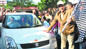 Actor Dharmendra flags off a car rally from a hotel in Sector 17 on Saturday.