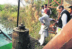 NABARD Chief General Manager DV Deshpande and his team at Lohagarh in Sirsa on Friday. A Tribune photograph