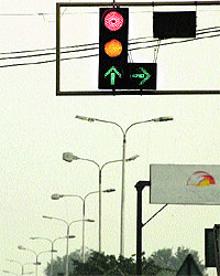 Red, yellow and green lights on simultaneously at Workshop Chowk in Jalandhar on Saturday