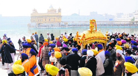 Sikh devotees take out a nagar kirtan at the Golden Temple in Amritsar on the eve of Guru Teg Bahadurs martyrdom day on Saturday.